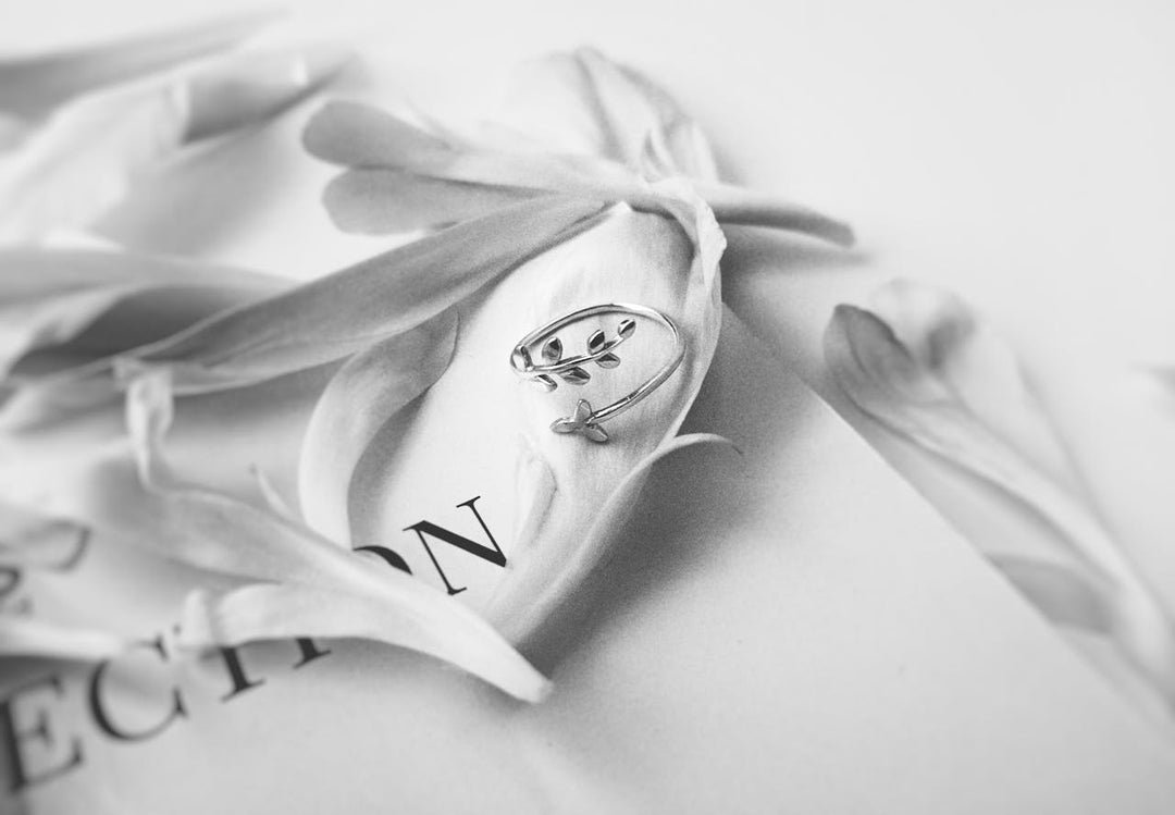Silver Antler  Metal Ring sitting on a white backdrop